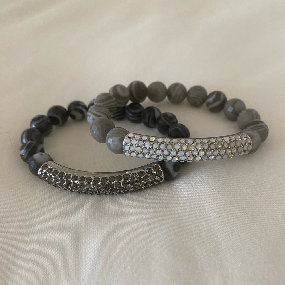 2 bracelets, marbled beads and pave set rhinestone detail